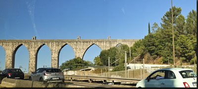 A stone bridge with a bridge over it