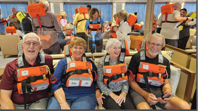 A group of people wearing life jackets