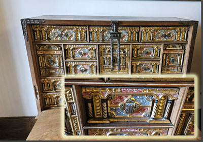 A close up of a chest of drawers